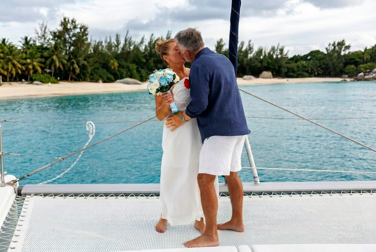 Marianne and Tom sharing a kiss on their wedding day aboard She's The Captain
